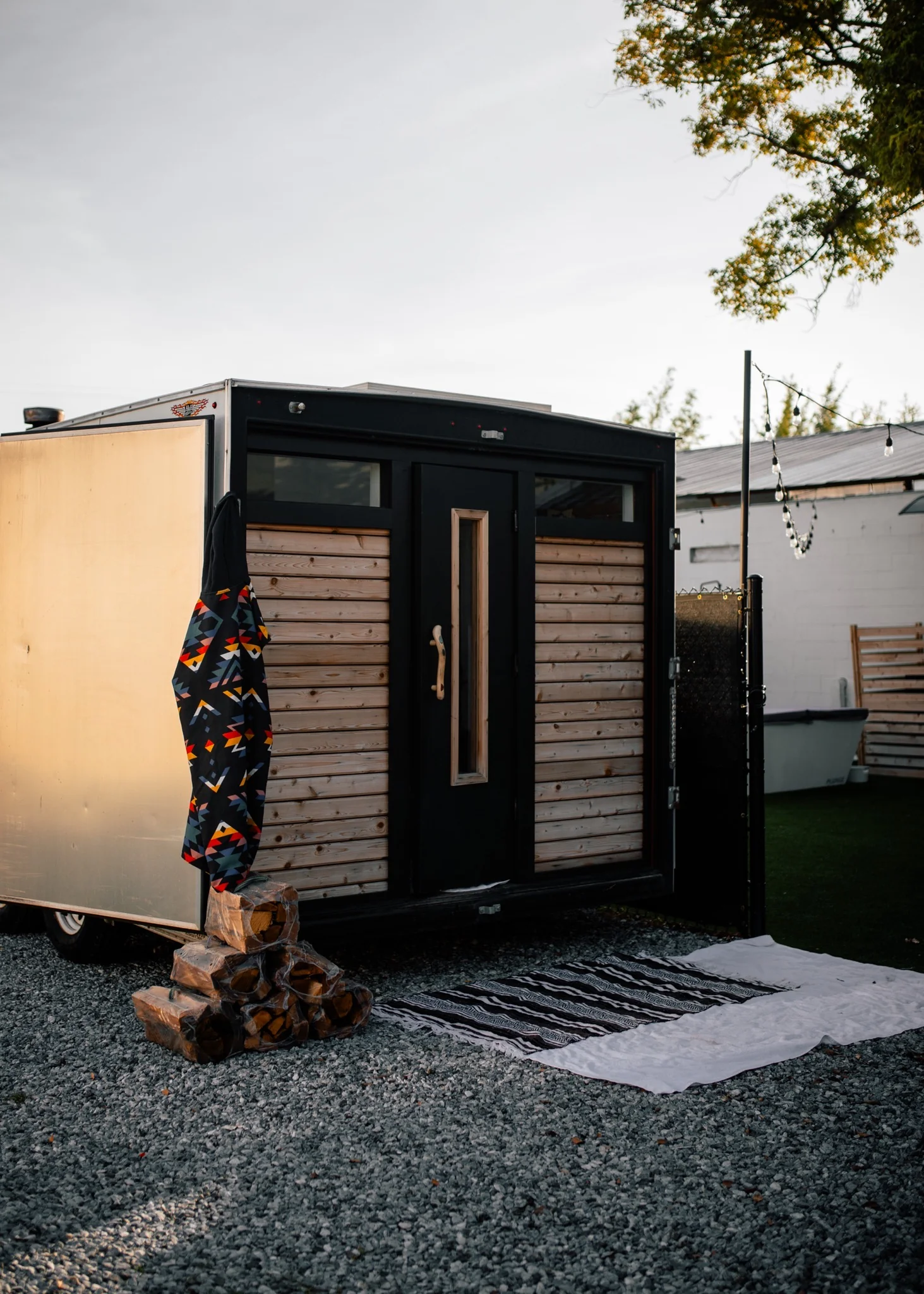 Breathing For Performance 20-person mobile sauna with firewood and recovery setup