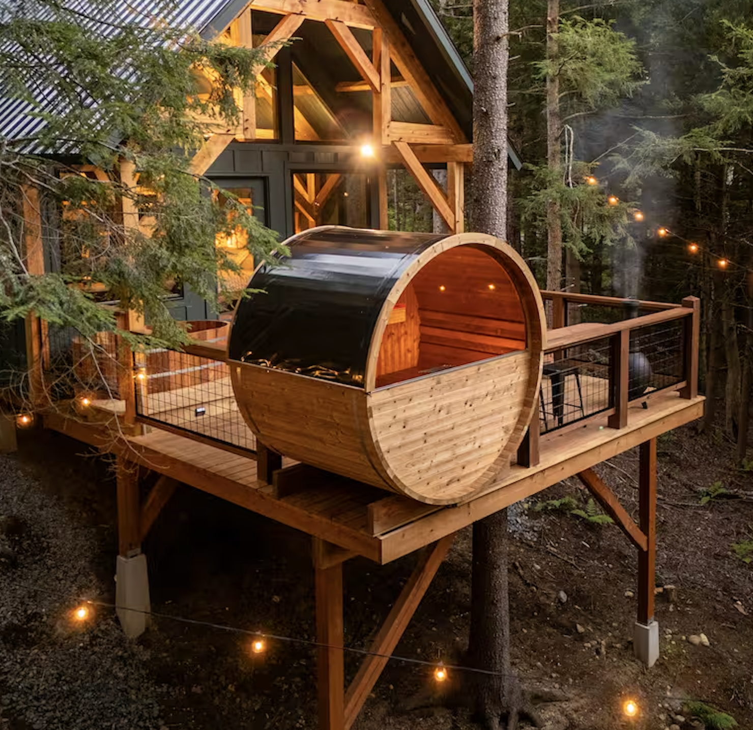 Premium treehouse sauna with barrel sauna experience