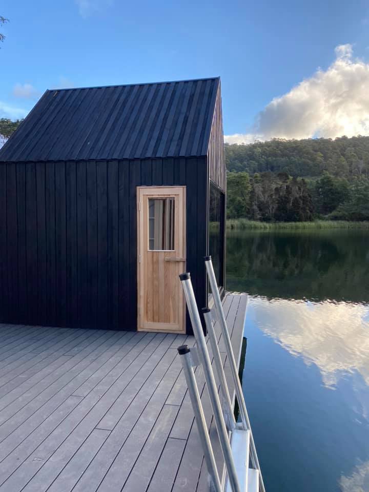 black sauna by the lake