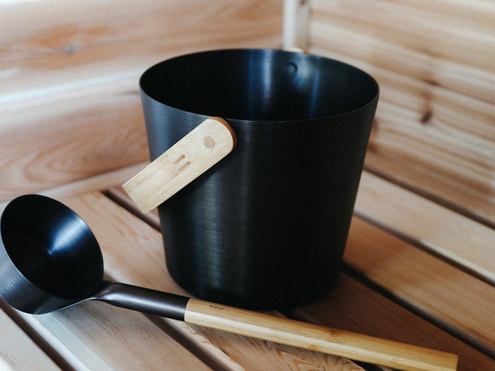 sauna ladle and bucket in oslo norway at a seaside sauna rental